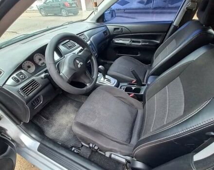 Сірий Міцубісі Lancer, об'ємом двигуна 1.58 л та пробігом 416 тис. км за 3100 $, фото 9 на Automoto.ua