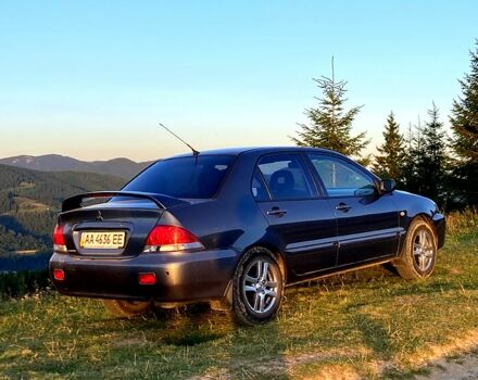 Сірий Міцубісі Lancer, об'ємом двигуна 1.6 л та пробігом 240 тис. км за 4450 $, фото 2 на Automoto.ua