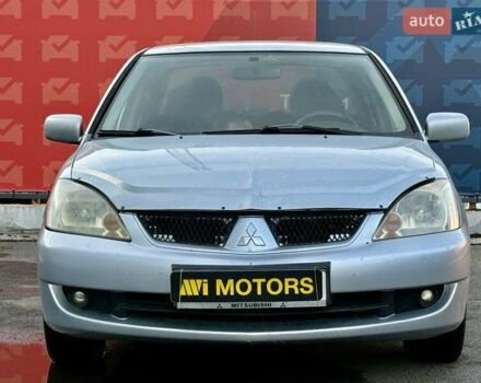 Сірий Міцубісі Lancer, об'ємом двигуна 1.6 л та пробігом 395 тис. км за 4900 $, фото 4 на Automoto.ua