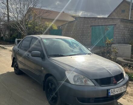 Серый Мицубиси Лансер, объемом двигателя 1.6 л и пробегом 200 тыс. км за 2300 $, фото 3 на Automoto.ua