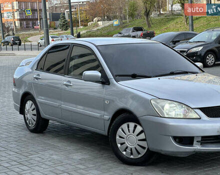 Серый Мицубиси Лансер, объемом двигателя 1.6 л и пробегом 200 тыс. км за 3900 $, фото 5 на Automoto.ua