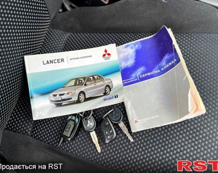 Сірий Міцубісі Lancer, об'ємом двигуна 1.6 л та пробігом 152 тис. км за 5700 $, фото 11 на Automoto.ua