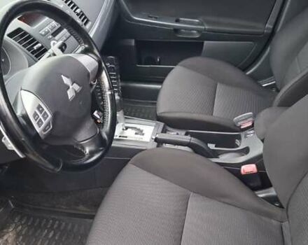 Серый Мицубиси Лансер, объемом двигателя 2 л и пробегом 189 тыс. км за 6800 $, фото 12 на Automoto.ua