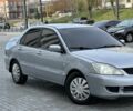 Сірий Міцубісі Lancer, об'ємом двигуна 1.6 л та пробігом 200 тис. км за 3900 $, фото 5 на Automoto.ua