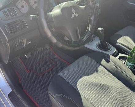 Серый Мицубиси Лансер, объемом двигателя 1.6 л и пробегом 265 тыс. км за 4100 $, фото 10 на Automoto.ua