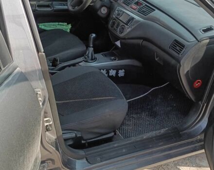 Сірий Міцубісі Lancer, об'ємом двигуна 1.6 л та пробігом 188 тис. км за 160000 $, фото 5 на Automoto.ua