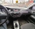 Серый Мицубиси Лансер, объемом двигателя 1.6 л и пробегом 268 тыс. км за 2900 $, фото 7 на Automoto.ua