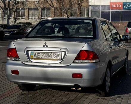 Сірий Міцубісі Lancer, об'ємом двигуна 1.6 л та пробігом 237 тис. км за 4950 $, фото 5 на Automoto.ua