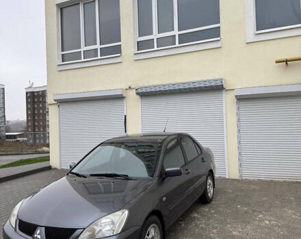 Серый Мицубиси Лансер, объемом двигателя 1.58 л и пробегом 187 тыс. км за 4800 $, фото 3 на Automoto.ua