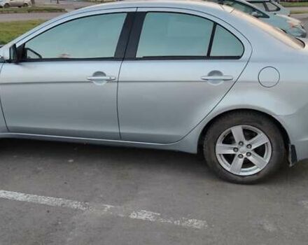 Серый Мицубиси Лансер, объемом двигателя 1.5 л и пробегом 201 тыс. км за 5600 $, фото 2 на Automoto.ua