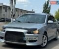 Сірий Міцубісі Lancer, об'ємом двигуна 2 л та пробігом 149 тис. км за 6798 $, фото 17 на Automoto.ua