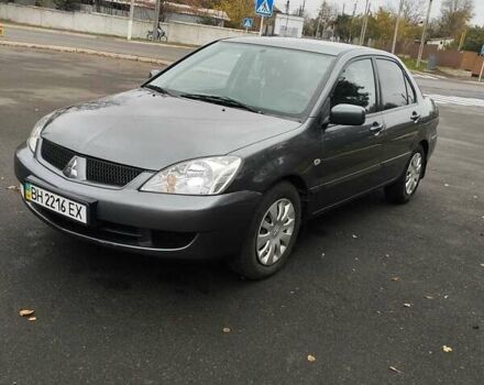 Серый Мицубиси Лансер, объемом двигателя 1.6 л и пробегом 181 тыс. км за 4500 $, фото 5 на Automoto.ua