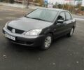 Серый Мицубиси Лансер, объемом двигателя 1.6 л и пробегом 181 тыс. км за 4500 $, фото 5 на Automoto.ua