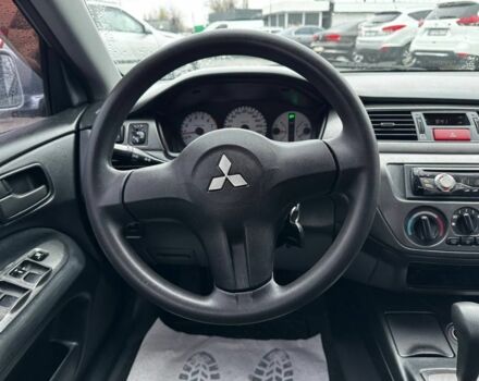 Серый Мицубиси Лансер, объемом двигателя 1.6 л и пробегом 205 тыс. км за 5300 $, фото 9 на Automoto.ua