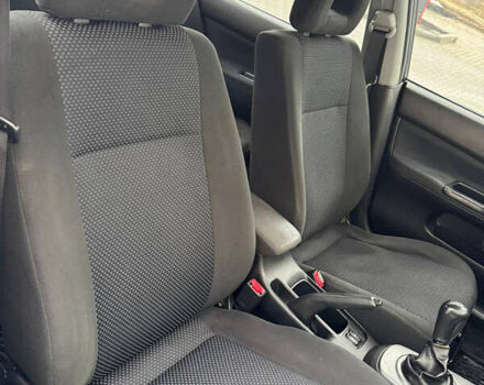 Серый Мицубиси Лансер, объемом двигателя 1.58 л и пробегом 187 тыс. км за 4800 $, фото 9 на Automoto.ua