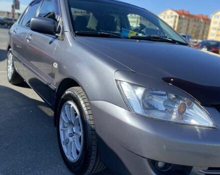 Сірий Міцубісі Lancer, об'ємом двигуна 1.6 л та пробігом 293 тис. км за 5000 $, фото 6 на Automoto.ua