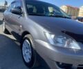 Сірий Міцубісі Lancer, об'ємом двигуна 1.6 л та пробігом 293 тис. км за 5000 $, фото 6 на Automoto.ua