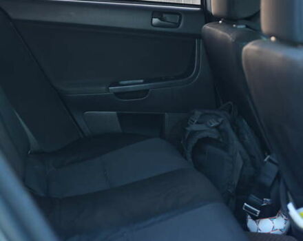 Серый Мицубиси Лансер, объемом двигателя 1.5 л и пробегом 330 тыс. км за 5250 $, фото 9 на Automoto.ua