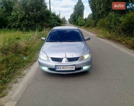 Серый Мицубиси Лансер, объемом двигателя 1.58 л и пробегом 200 тыс. км за 2300 $, фото 6 на Automoto.ua