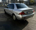 Сірий Міцубісі Lancer, об'ємом двигуна 1.6 л та пробігом 249 тис. км за 5100 $, фото 2 на Automoto.ua