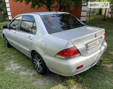 Сірий Міцубісі Lancer, об'ємом двигуна 1.6 л та пробігом 250 тис. км за 5500 $, фото 3 на Automoto.ua