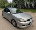 Серый Мицубиси Лансер, объемом двигателя 2 л и пробегом 202 тыс. км за 4800 $, фото 1 на Automoto.ua