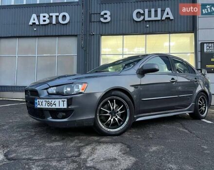 Серый Мицубиси Лансер, объемом двигателя 2 л и пробегом 170 тыс. км за 6999 $, фото 3 на Automoto.ua