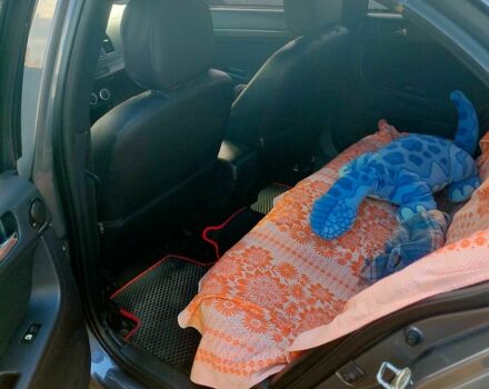 Серый Мицубиси Лансер, объемом двигателя 2 л и пробегом 351 тыс. км за 7000 $, фото 8 на Automoto.ua