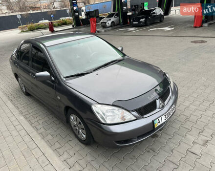 Сірий Міцубісі Lancer, об'ємом двигуна 1.6 л та пробігом 115 тис. км за 2800 $, фото 6 на Automoto.ua