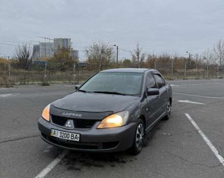 Серый Мицубиси Лансер, объемом двигателя 1.6 л и пробегом 350 тыс. км за 2850 $, фото 10 на Automoto.ua