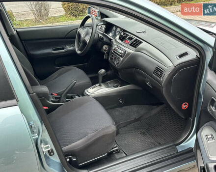 Сірий Міцубісі Lancer, об'ємом двигуна 1.6 л та пробігом 116 тис. км за 5199 $, фото 32 на Automoto.ua
