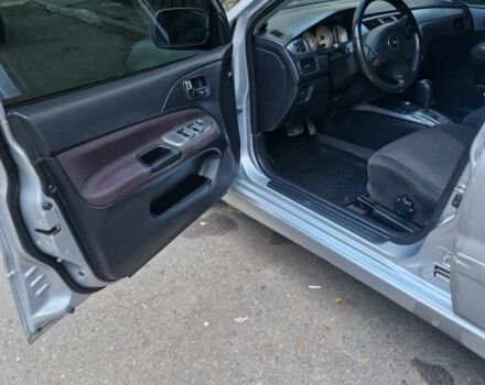 Серый Мицубиси Лансер, объемом двигателя 2 л и пробегом 231 тыс. км за 4500 $, фото 14 на Automoto.ua