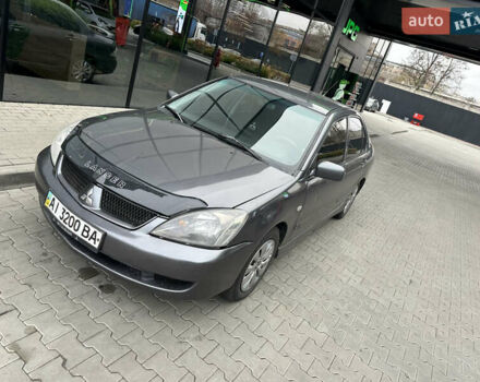 Сірий Міцубісі Lancer, об'ємом двигуна 1.6 л та пробігом 115 тис. км за 2800 $, фото 8 на Automoto.ua