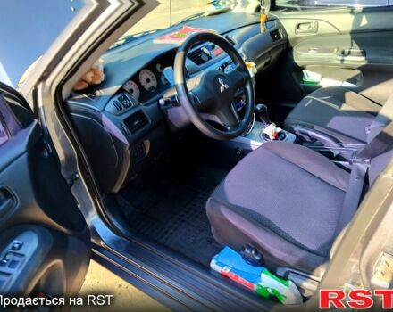 Серый Мицубиси Лансер, объемом двигателя 1.6 л и пробегом 190 тыс. км за 4200 $, фото 5 на Automoto.ua