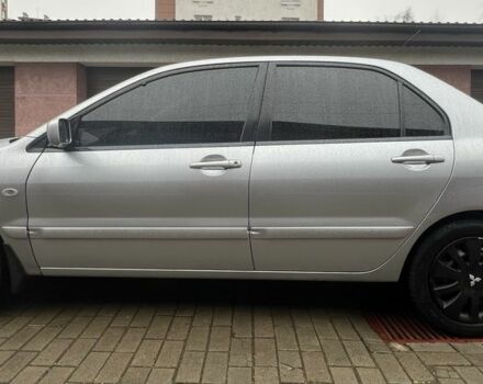 Серый Мицубиси Лансер, объемом двигателя 1.6 л и пробегом 272 тыс. км за 4500 $, фото 1 на Automoto.ua