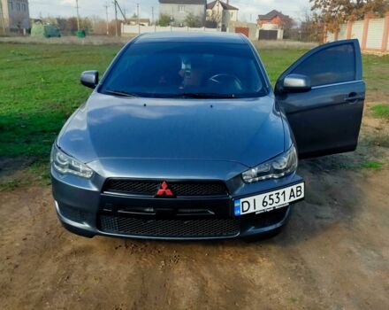 Серый Мицубиси Лансер, объемом двигателя 2 л и пробегом 351 тыс. км за 7000 $, фото 1 на Automoto.ua