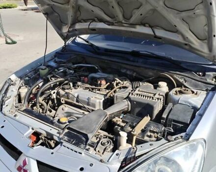 Серый Мицубиси Лансер, объемом двигателя 1.6 л и пробегом 210 тыс. км за 3500 $, фото 13 на Automoto.ua