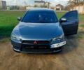 Серый Мицубиси Лансер, объемом двигателя 2 л и пробегом 351 тыс. км за 7000 $, фото 1 на Automoto.ua