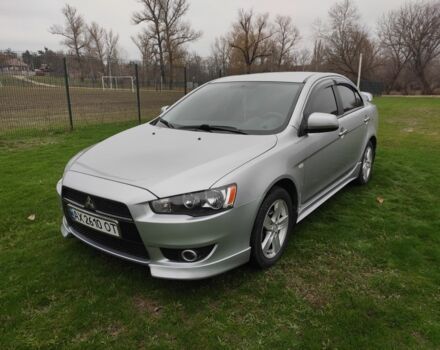 Серый Мицубиси Лансер, объемом двигателя 2 л и пробегом 124 тыс. км за 7499 $, фото 2 на Automoto.ua