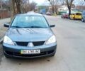 Серый Мицубиси Лансер, объемом двигателя 1.58 л и пробегом 142 тыс. км за 4700 $, фото 1 на Automoto.ua