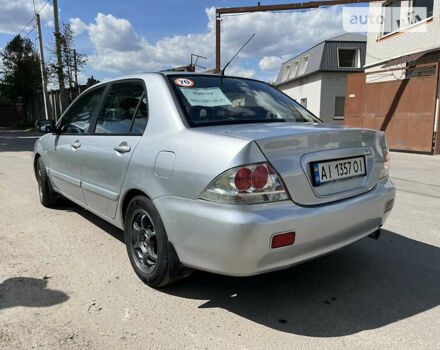 Сірий Міцубісі Lancer, об'ємом двигуна 1.6 л та пробігом 226 тис. км за 4000 $, фото 2 на Automoto.ua