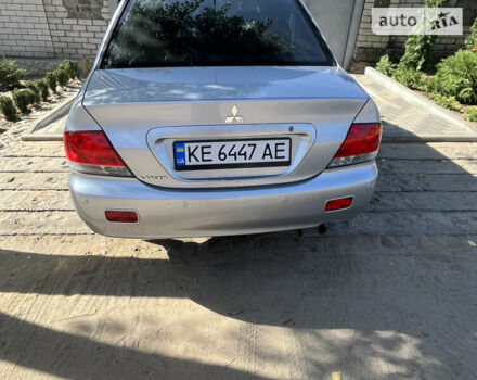 Сірий Міцубісі Lancer, об'ємом двигуна 1.58 л та пробігом 212 тис. км за 5600 $, фото 3 на Automoto.ua