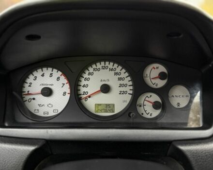 Сірий Міцубісі Lancer, об'ємом двигуна 1.6 л та пробігом 247 тис. км за 4900 $, фото 6 на Automoto.ua