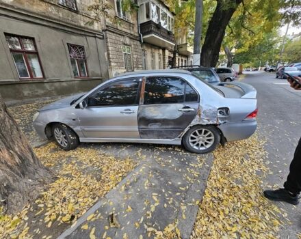 Серый Мицубиси Лансер, объемом двигателя 1.6 л и пробегом 199 тыс. км за 1450 $, фото 3 на Automoto.ua