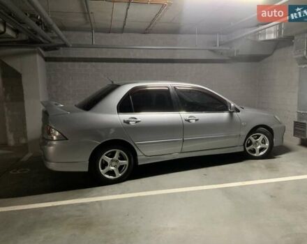 Серый Мицубиси Лансер, объемом двигателя 1.6 л и пробегом 196 тыс. км за 3800 $, фото 3 на Automoto.ua