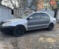 Сірий Міцубісі Lancer, об'ємом двигуна 1.58 л та пробігом 305 тис. км за 3300 $, фото 1 на Automoto.ua
