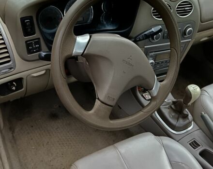 Серый Мицубиси Лансер, объемом двигателя 1.6 л и пробегом 180 тыс. км за 1300 $, фото 2 на Automoto.ua