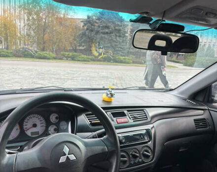 Серый Мицубиси Лансер, объемом двигателя 1.6 л и пробегом 222 тыс. км за 5200 $, фото 14 на Automoto.ua