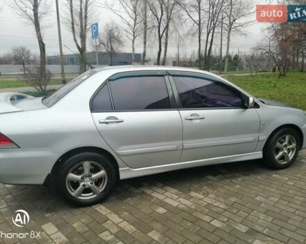 Сірий Міцубісі Lancer, об'ємом двигуна 1.6 л та пробігом 225 тис. км за 5200 $, фото 1 на Automoto.ua