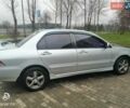 Сірий Міцубісі Lancer, об'ємом двигуна 1.6 л та пробігом 225 тис. км за 5200 $, фото 1 на Automoto.ua